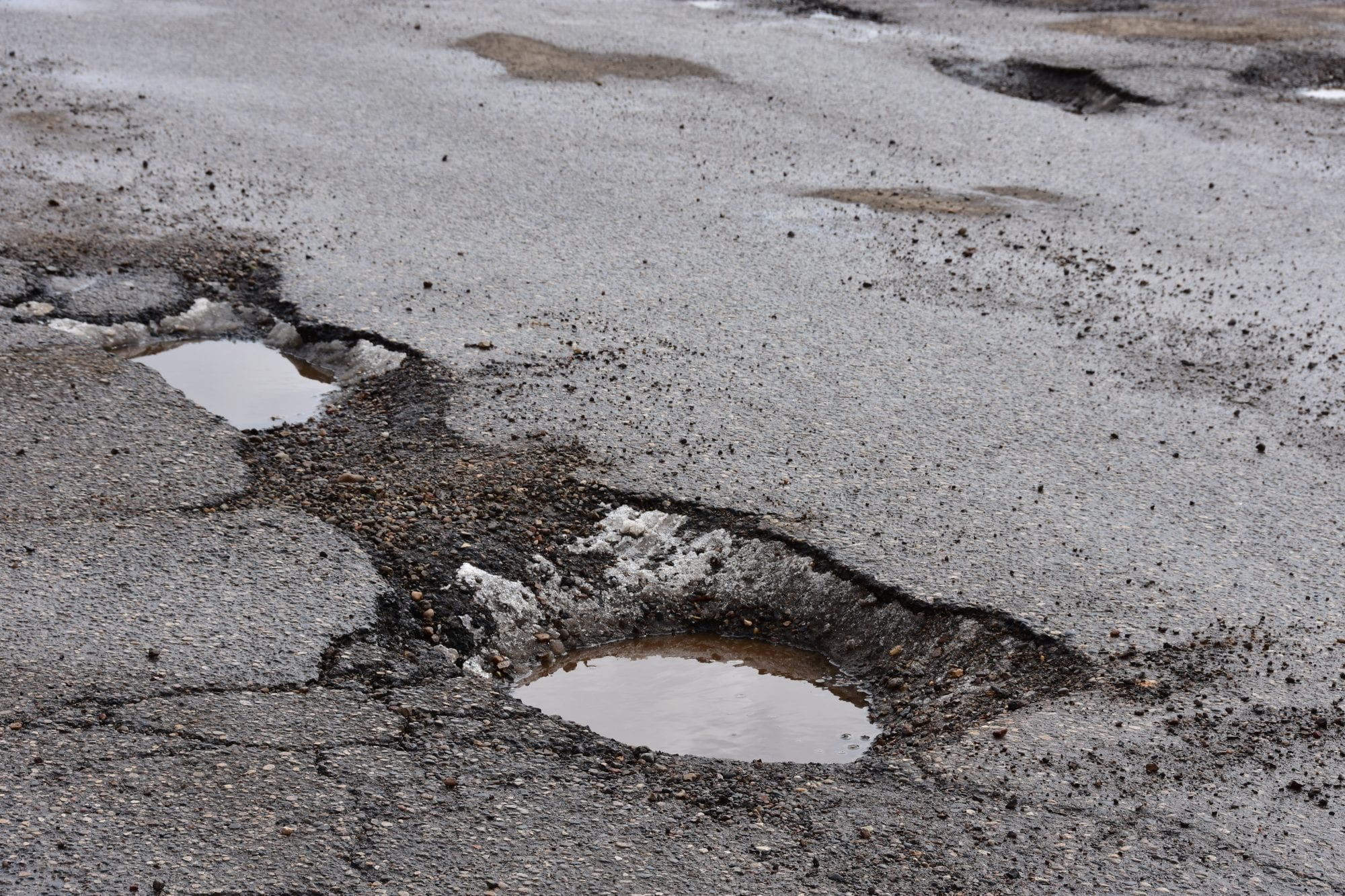 Picture of potholes in a road